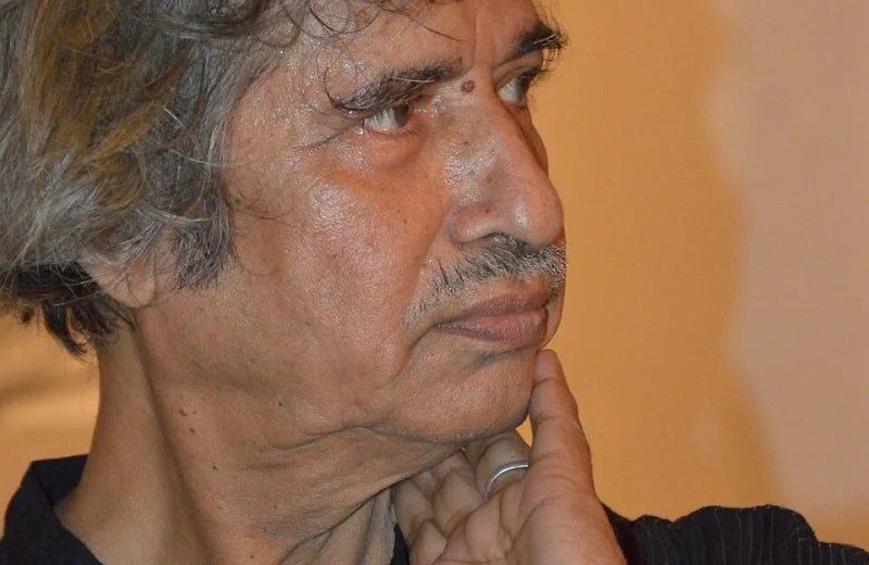 Jogen Chowdhury Dies at 87: Kolkata Remembers the Master of the Unbroken Line 1 Jogen Chowdhury in profile with his hand against his face at a Kolkata art event in 2012